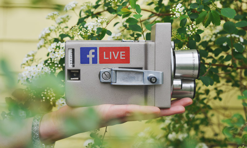 Video camera with Facebook Live logo